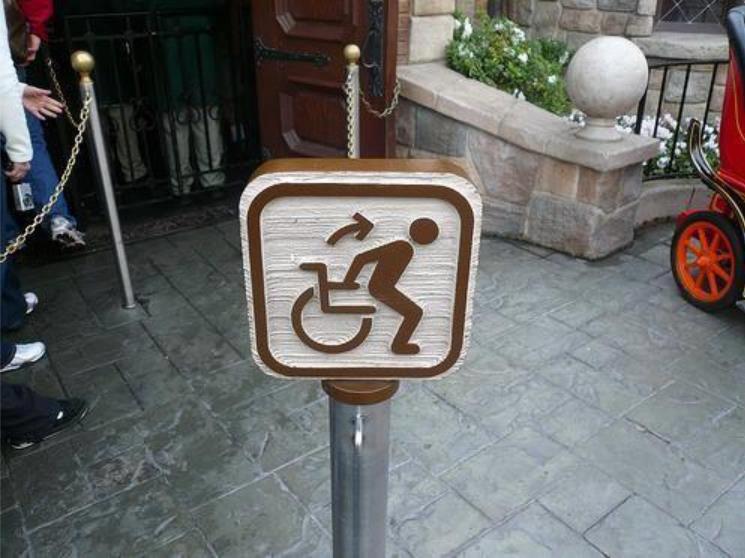 wheelchair symbol with stick figure standing up